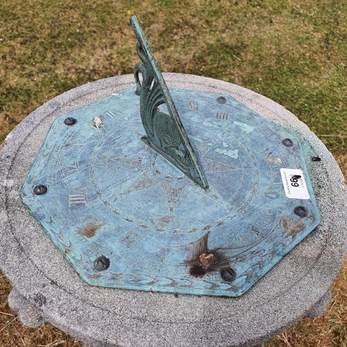 66 - A garden sundial, on a reconstituted stone plinth and base, approx. 118 cm high