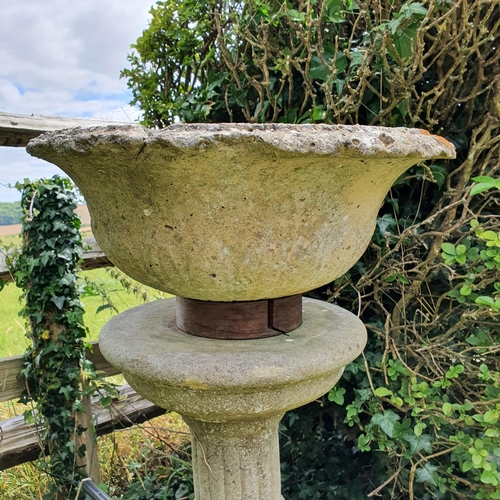 74 - A blue glazed garden pot, approx. 44 cm high, and a reconstituted stone garden urn, on a stand, repa... 