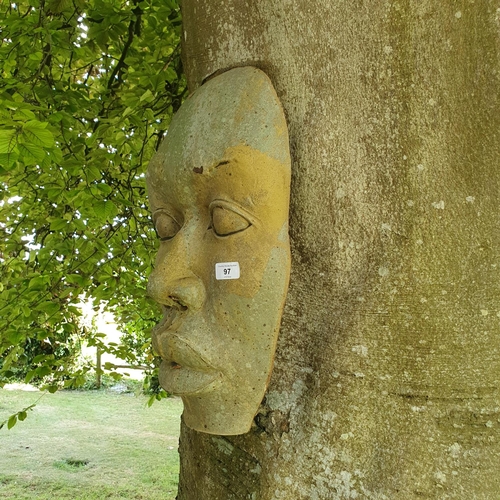 97 - A pottery face mask garden ornament, approx. 49 cm high (hanging on the Beech tree)