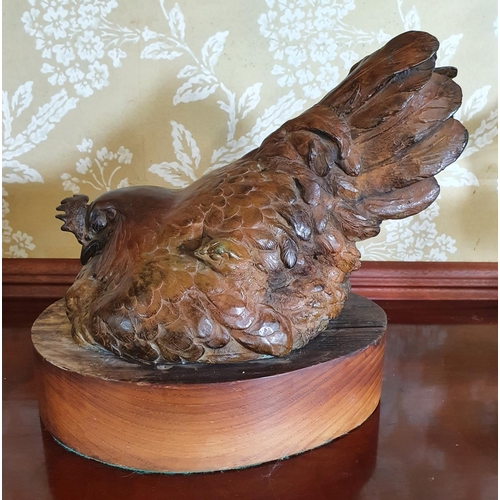 262 - An Anne Shingleton bronze group, Broody Hen, on a wooden base, 30.5 cm high