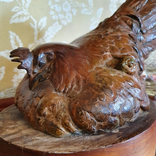 262 - An Anne Shingleton bronze group, Broody Hen, on a wooden base, 30.5 cm high