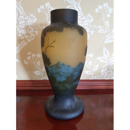 264 - A Gallé style cameo glass vase, decorated trees and foliage, 33.5 cm high