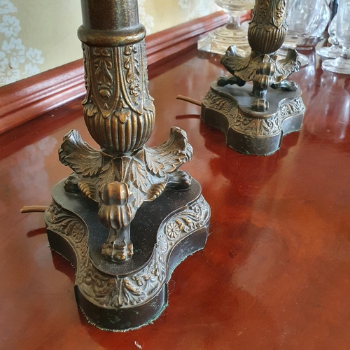 266 - A pair of French Empire style metal candlesticks, with shades, 62 cm high (overall)