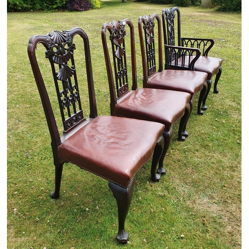 272 - A George III style mahogany carver chair, the back carved and pierced ribbon ties and swags, with a ... 