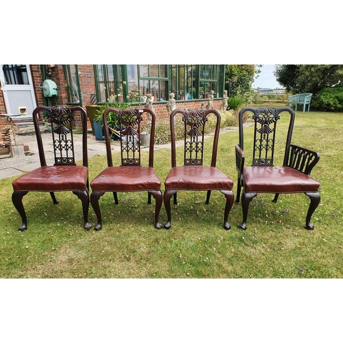 272 - A George III style mahogany carver chair, the back carved and pierced ribbon ties and swags, with a ... 