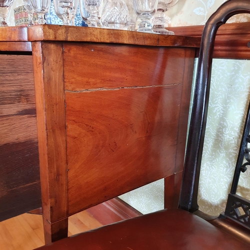 277 - A 19th century inlaid mahogany sideboard, with a bow front central section having three drawers, on ... 