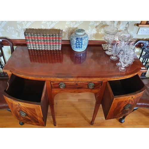 277 - A 19th century inlaid mahogany sideboard, with a bow front central section having three drawers, on ... 