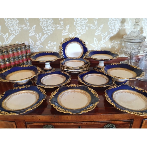 279 - A Copeland Spode porcelain part dessert service, decorated in blue and with gilt, comprising four co... 