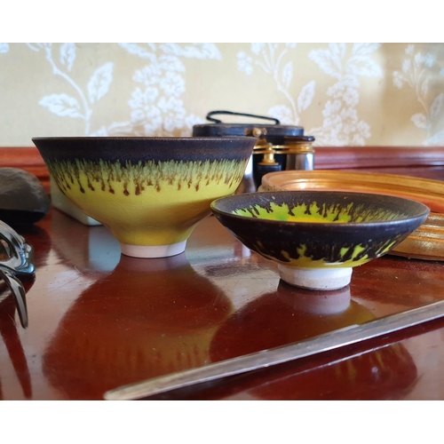 290 - A studio pottery bowl, with a yellow glaze, 11.5 cm diameter, another smaller, a pair of opera glass... 