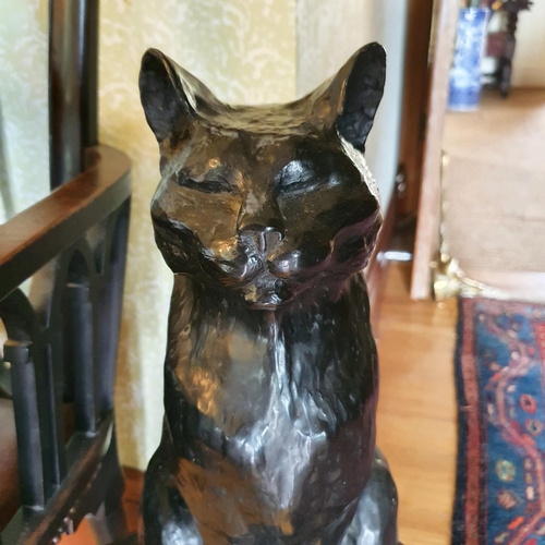 313 - A bronzed figure of a seated cat, 40.5 cm high, on a plinth base, 73 cm high (overall)