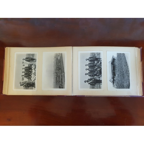 328 - A late 19th/early 20th century photograph album, including topographical views, and African cricket ... 