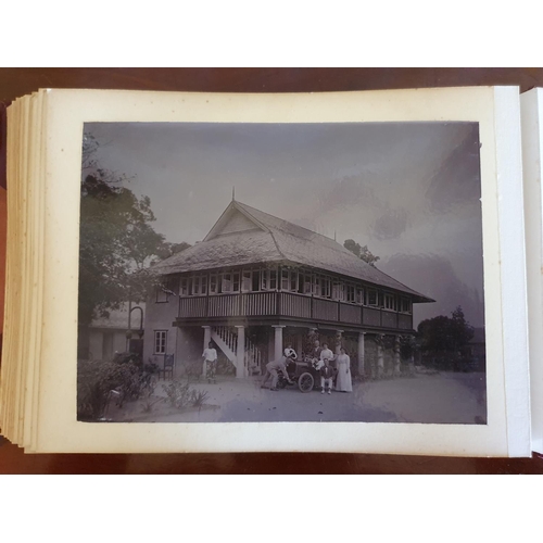 328 - A late 19th/early 20th century photograph album, including topographical views, and African cricket ... 