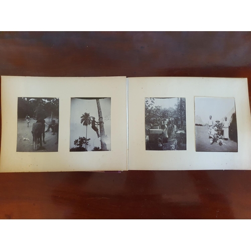 328 - A late 19th/early 20th century photograph album, including topographical views, and African cricket ... 