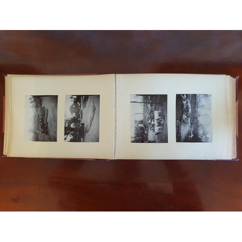 328 - A late 19th/early 20th century photograph album, including topographical views, and African cricket ... 