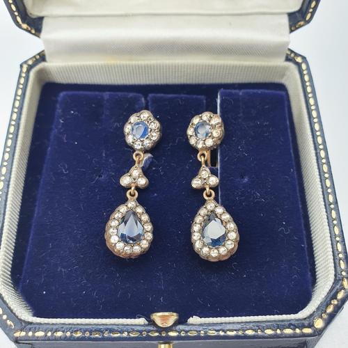 345 - A pair of diamond and sapphire pendant drop earrings, boxed