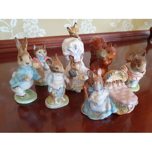 360 - A Beswick Beatrix Potter Lady Mouse from Tailor of Gloucester figure, gold back stamp, and seven oth... 