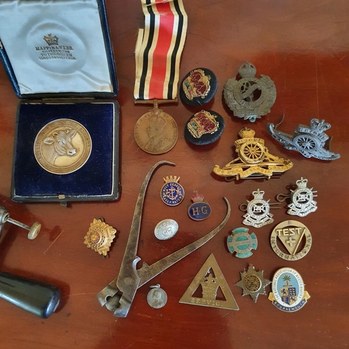 382 - A Special Constabulary medal, various badges and other items