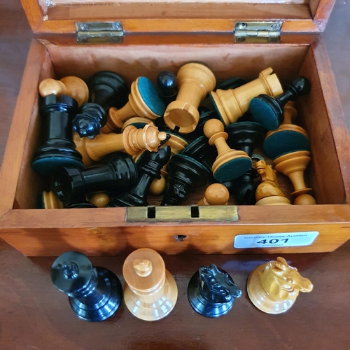 401 - A boxwood and stained chess set, boxed