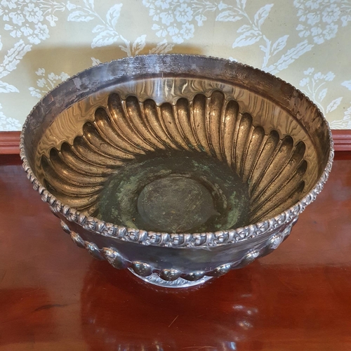 410 - A large silver plated punch bowl, with gadroon style decoration, 42 cm diameter