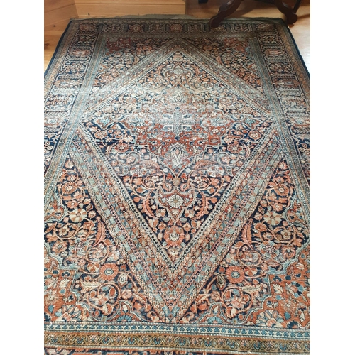 430 - A Persian rug, with a central medallion, 200 x 130 cm