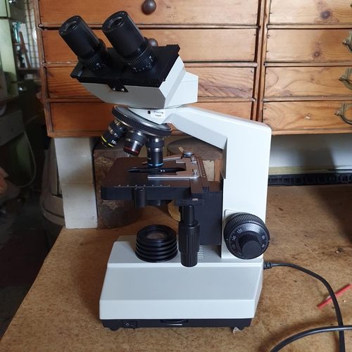 128 - An elecric laboratory binocular microscope