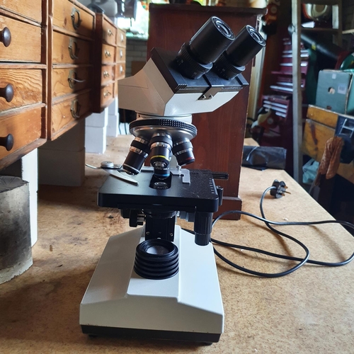 128 - An elecric laboratory binocular microscope