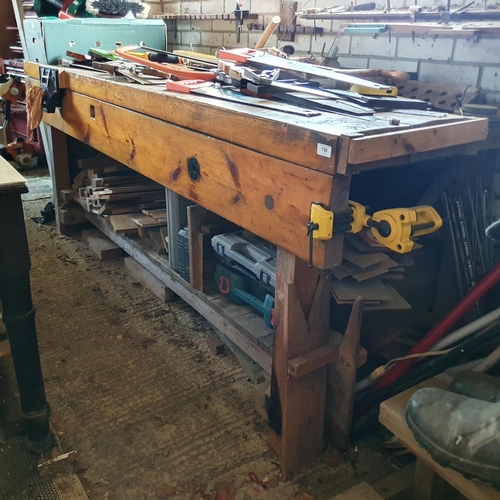 130 - A workbench, 239 cm wide x 82 cm deep x 91.5 cm high