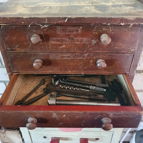 132 - A late Victorian table top chest, of four drawers, 33 cm wide, with contents of tools, and a similar... 