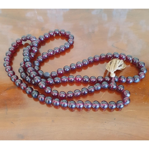 470 - A set of cherry amber type worry beads