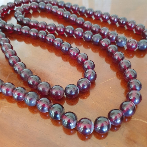 470 - A set of cherry amber type worry beads