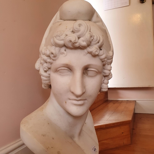 476 - A late 19th/early 20th century carved marble bust, on a socle base, approx. 60 cm high