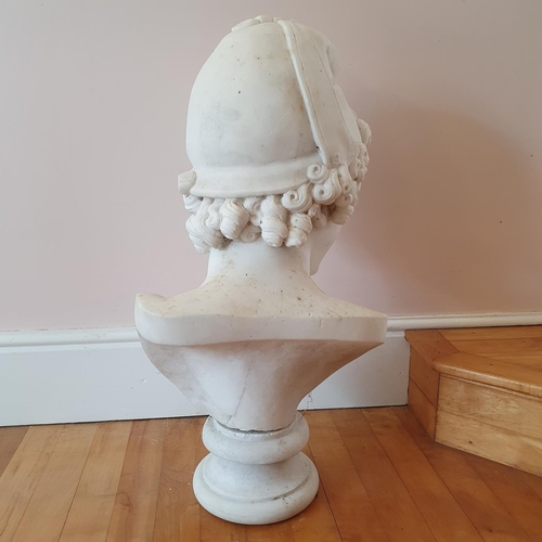 476 - A late 19th/early 20th century carved marble bust, on a socle base, approx. 60 cm high