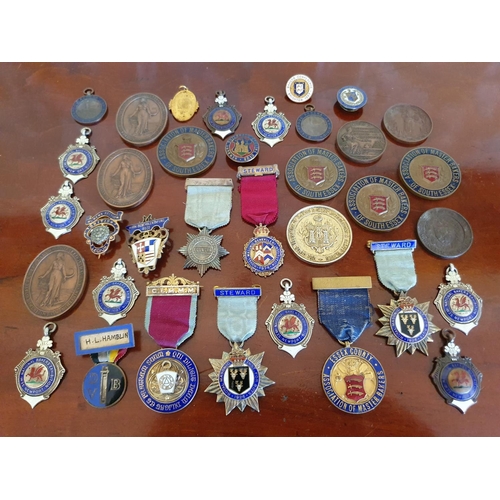 515 - A group of assorted silver and enamel bakery and Masonic medallions, and others similar