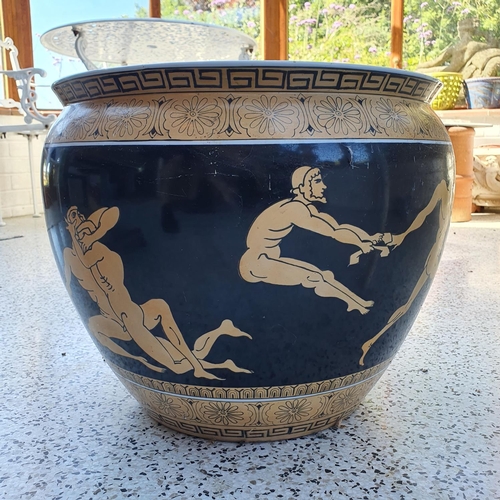 536 - A large jardinière, the exterior decorated Greek figures, the interior with fish, 42 cm diameter