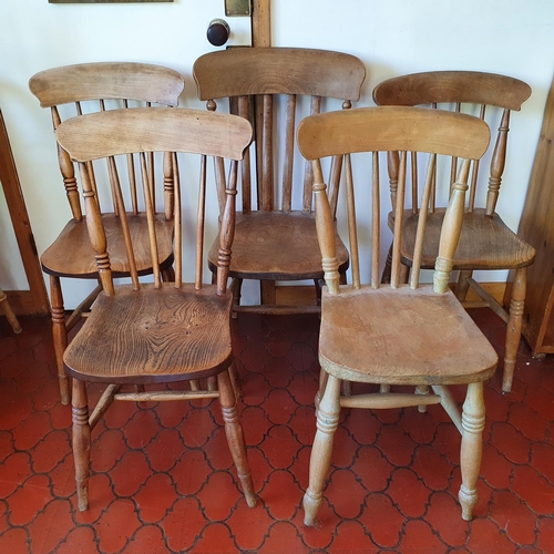 542 - The Kitchen.
A beech and elm kitchen stick back armchair, and six similar single chairs (7)