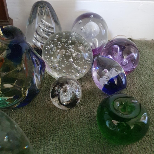 563 - A large glass dump type weight, 60 cm high, and other assorted glass weights (qty)