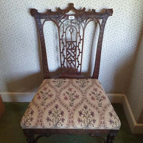 567 - A Chippendale design single chair, with a pierced vase shaped back and on cluster column legs