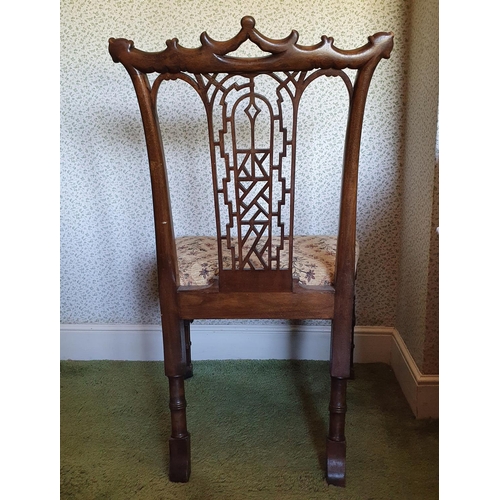 567 - A Chippendale design single chair, with a pierced vase shaped back and on cluster column legs