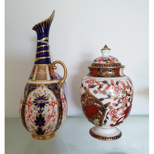 585 - A Royal Crown Derby vase, 17.5 cm high, and a similar Derby vase and cover, 13 cm high (2)