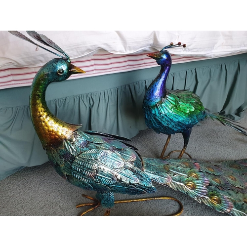 593 - A painted metalwork figure of a peacock, 43 cm high, another similar, 49 cm high, a similar kingfish... 