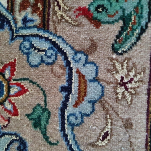 616 - A Persian runner, decorated foliage on a cream ground, 330 x 75 cm