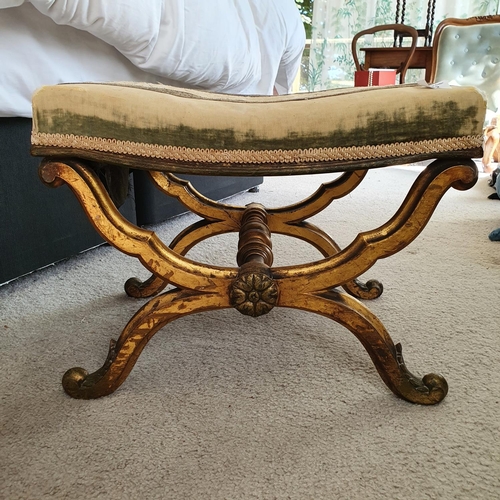 642 - A gilt X frame stool, 52 cm wide