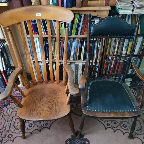 656 - An Edwardian beech and elm stick back kitchen armchair, and a similar American armchair