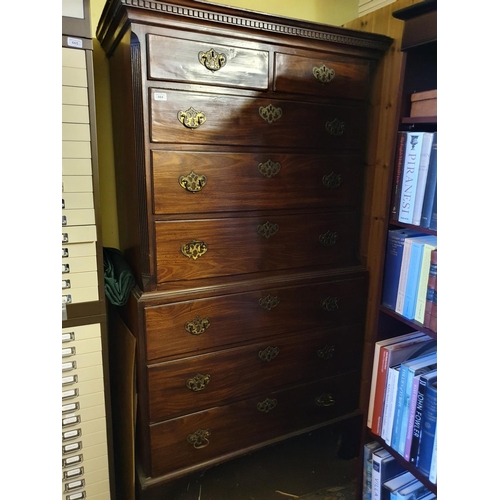 664 - A George III mahogany tallboy chest on chest, the moulded and dentil cornice above two short and thr... 