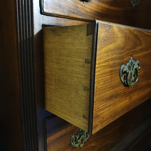 664 - A George III mahogany tallboy chest on chest, the moulded and dentil cornice above two short and thr... 