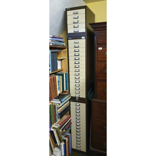 665 - Three Silverline metal cabinets, 28 cm wide, with contents of booklets and pamphlets