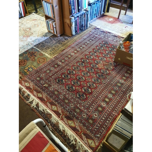 669 - A Baluchi rug, 104 x 94 cm, and all the other carpets and rugs on the floor (qty)