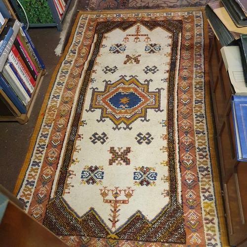 669 - A Baluchi rug, 104 x 94 cm, and all the other carpets and rugs on the floor (qty)