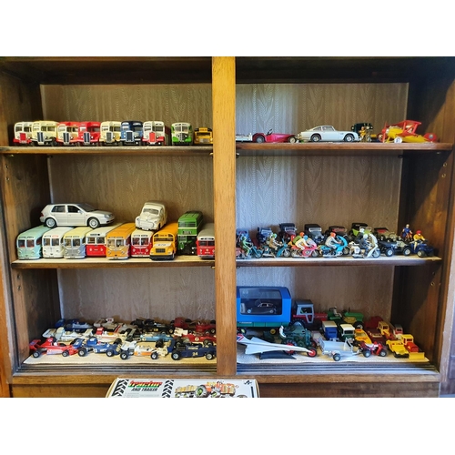 670 - Assorted model buses, racing cars, other cars and motorcycles