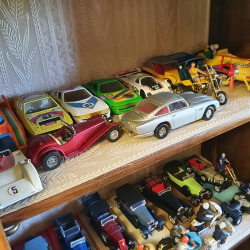 670 - Assorted model buses, racing cars, other cars and motorcycles